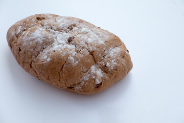 brown grain rye bread isolated on a white background