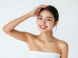 Wall Mural - radiant Asian model smiles confidently, showcasing her flawless skin and natural beauty in skincare advertisement. Her joyful expression highlights essence of cosmetics and self care