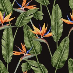 Tropical flowers strelitzia and leaves palm seamless pattern on black background. Watercolor illustration for textile, fabric, wallpaper, card, packaging, party.