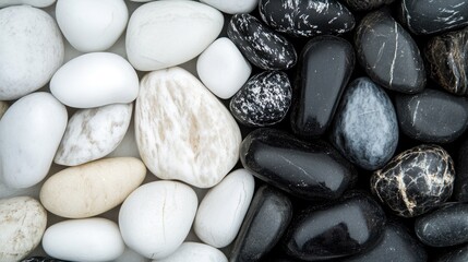 Poster - A collection of white and black stones arranged side by side