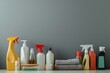 © Thanapong - Cleaning supplies arranged neatly on a table, including sprays, cloths, and brushes, with ample blank space for commercial text about cleaning products and home maintenance solutions