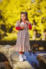 Wall Mural - portrait of a child in autumn 