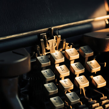 old typewriter on a wooden table