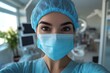 © Bold24 - a selfie of a female doctor with a mask on her face