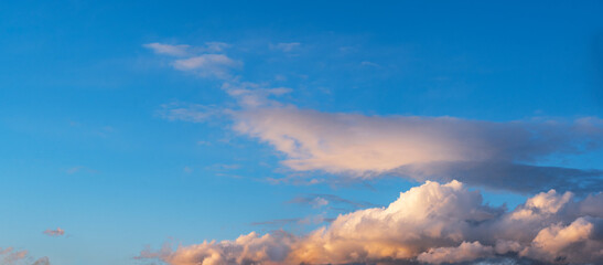Wall Mural - sky background. blue evening sunset sky with clouds.