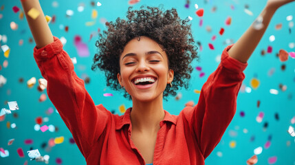 A joyful celebration with a young woman smiling and raising her arms amid colorful confetti during a vibrant party setting