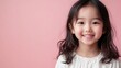 © Chatchanan - Half-body shot of a half-Korean child model wearing a modern outfit, looking directly at the