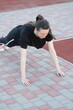 © 4Max - Woman doing workout exercises outside