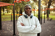 © Marko Geber - Portrait of a senior man exercising at outdoor fitness park in autumn