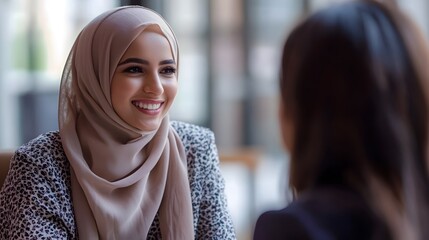 Two Diverse Business Women Discussing Collaborative Work Project