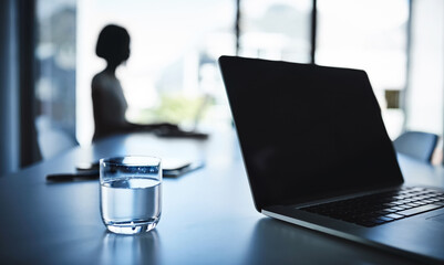 Poster - Boardroom, glass and laptop with silhouette of businesswoman in office for corporate career. Computer, dark and water with employee person in professional workplace for administration or research