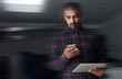 © peopleimages.com - Typing, serious and man with smartphone, online and motion blur of busy entrepreneur, web and digital. Professional, networking and person with tablet, content creator and research for thumbnail