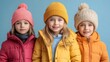 © Sandu - Smiling children in colorful winter clothing