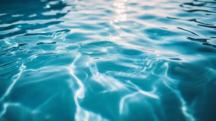 Aufkleber - Gentle waves and ripples on a blue swimming pool surface, illustrating a tranquil and cooling effect.