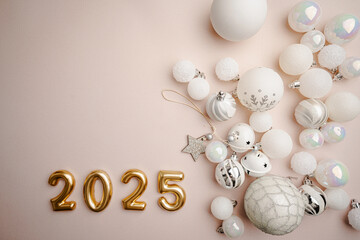 Wall Mural - christmas and happy new year 2025 with white glitter decorations on beige background. holiday party 
