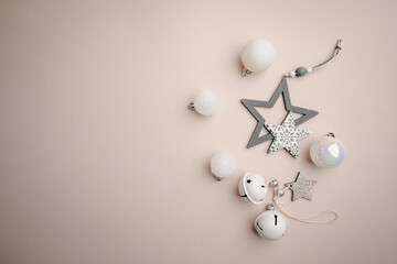 Wall Mural - christmas and happy new year 2025 with white glitter decorations on beige background. holiday party 