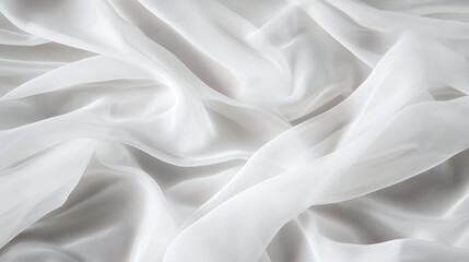 Poster - delicate white fabric draped gracefully on a soft surface, showcasing its sheer texture and flowing 
