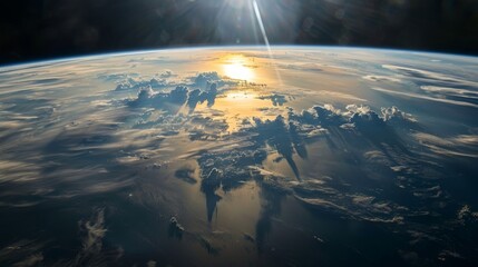 Poster - Earth from space with sunlight illuminating the atmosphere