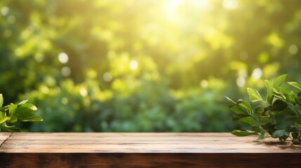Poster - Natural wooden table with a blurred greenery background, soft morning light