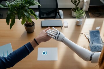 Poster - The human hand is in contact with the robot hand.