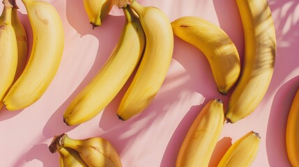 Aufkleber - Top view of bananas lying on a pastel pink background
