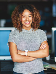 Computer, portrait and happy woman in startup with arms crossed, confidence or growth mission in office. Face, company or proud female designer in workplace for development, ambition and opportunity