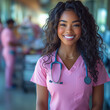 © Digital Artist - Black Woman Nurse Smiling Wearing Pink Scrubs with Stethoscope, Hospital Employee