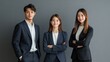 © khonkangrua - Young Executives Posing in Modern Office Space