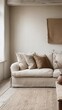© furyon - minimalistic modern living room features a vacant white wall and a stylish beige couch creating a serene and sophisticated atmosphere encouraging relaxation in a contemporary setting