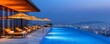 © lnwAI - Hotel amenities at a rooftop pool with comfortable sun loungers, umbrellas, and breathtaking city views warm, vibrant lighting enhances an atmosphere of luxury and relaxation