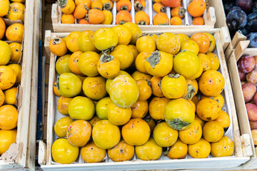 Wall Mural - fresh organic health vegetable market fruit harvest raw vegetarian green food juicy persimmon