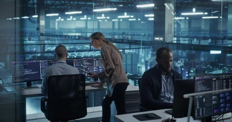 Poster - Modern Office in a Server Facility: Female Data Scientist and Male Cybersecurity Expert Analyze Data Together on a Desktop Computer, Brainstorming New Security Solutions and Services