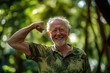 © AspctStyle - Happy senior man flexing his arm confidently outdoors, embodying health, strength, and positivity in a lush green environment. Senior man smiling and flexing arm in outdoor park