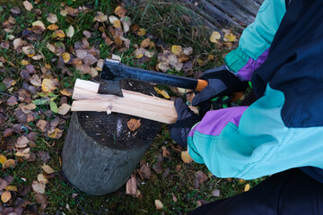 Chopping wood with an axe