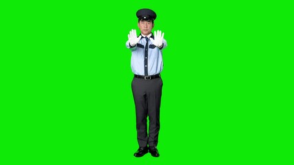 Leinwandbilder - ストップする男性警備員　クロマキー合成用グリーンバック動画