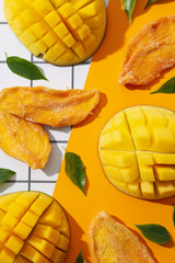 Wall Mural - Dried mango chips with fresh sliced mango