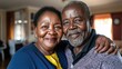© Pannee - Happy Senior Couple Smiling Together in Home Setting