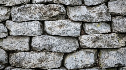 Canvas Print - Gray stacked granite stone wall background creates a textured and stylish ambiance. This gray granite stone wall background adds depth and interest, perfect for various design needs.