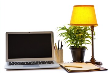 Wall Mural - A laptop computer sits on a desk next to a lamp, ready for use