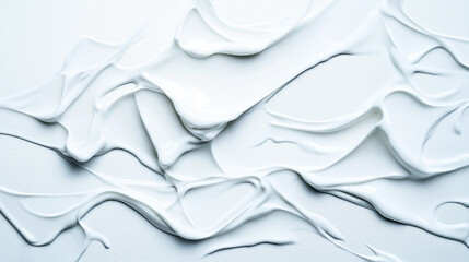 Abstract pattern of white creamy texture with smooth and wavy shapes on a textured surface