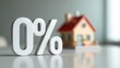 © SerPak - A decorative model house sits in the background while a large zero percent sign stands in the foreground, symbolizing attractive mortgage offers for buyers looking to purchase homes in todays market.