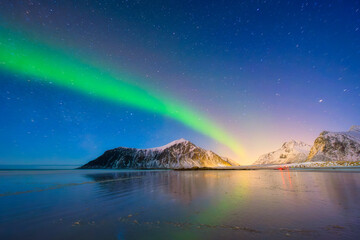 Wall Mural - aurora borealis in scandinavia. norway, lofoten islands. northern lights over the mountains. starry 