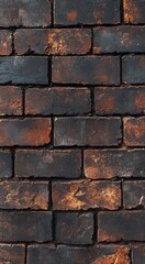 Wall Mural - Textured dark brick wall with rusty highlights showing age and character in an urban setting