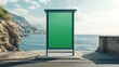 © Chanwit - Outdoor advertising billboard with a green screen by the sea, set against a coastal landscape backdrop under a clear blue sky.