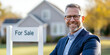 © Jaruwan photo - confident real estate agent stands in front of house for sale, showcasing professionalism and approachability. background features well maintained property, enhancing inviting atmosphere