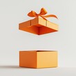 © SERHII - Floating orange gift box with ribbon: creative and minimalist design concept