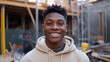 © Vika art - African American teenage boy in beige hoodie.