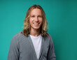 © Ranta Images - Happy Man Smiling Against Colorful Studio Background