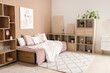 Stylish teenager's bedroom with bed and shelving unit