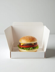 Poster - A hamburger is displayed in an empty white box on a clean surface.